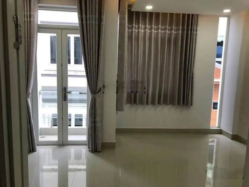 HXH Chu Văn An P12 4,7x12m vuông vức trệt lửng 2 lầu ST gồm 7PN, doanh thu 30tr/tháng