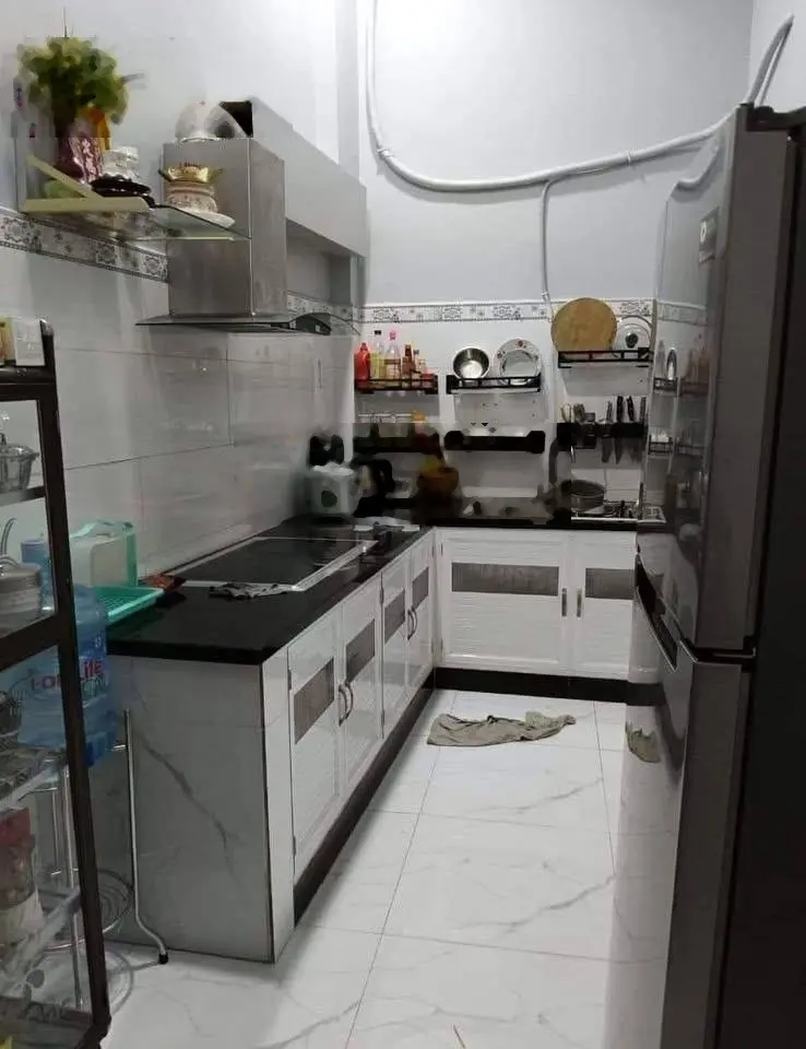 Nhà đẹp ngay chợ Bình Chánh 5x20 , 1 lầu giá 790 triệu