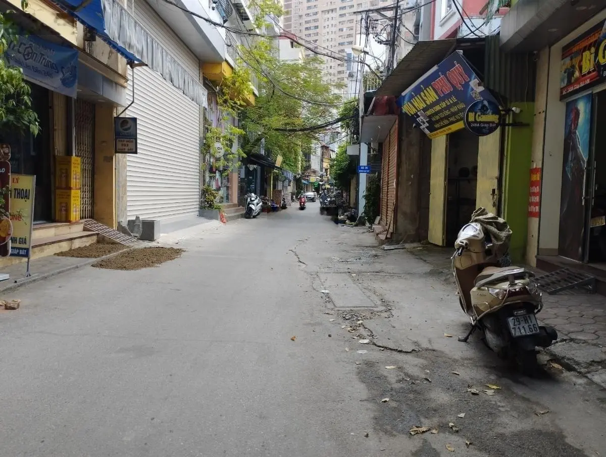 Bán nhà Láng Đống Đa nhà đẹp ở ngay ô tô lùi đỗ cửa ngõ rộng thoáng có thang máy 50m2/5T/4mmt 11tỷ