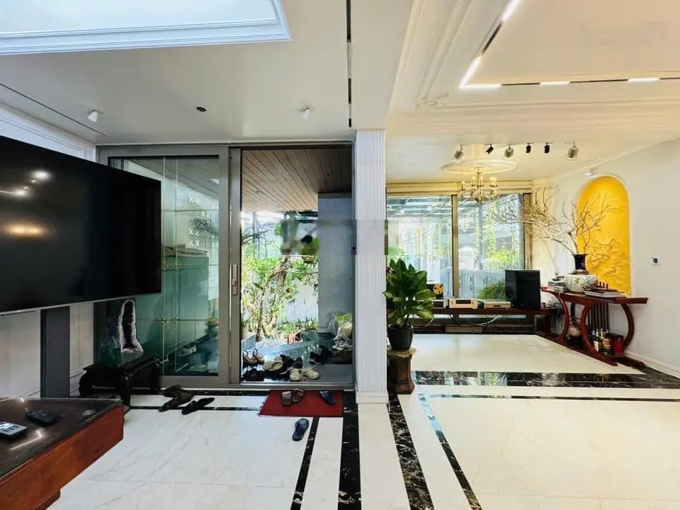 Bán nhà Xã Đàn Đông Đa kinh doanh văn phòng,ô tô đõ cửa,ngõ thông dòng tiền 82m2/9T/7mMT 19tỷ