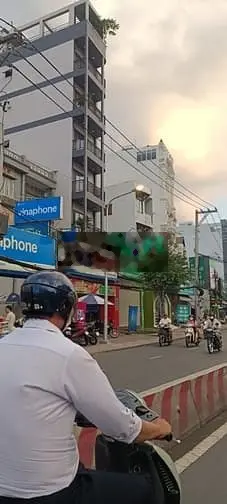 Nhà mặt tiền Huỳnh Tấn Phát, đang cho thuê kdbb. ngang hơn 7 m nở hậu.