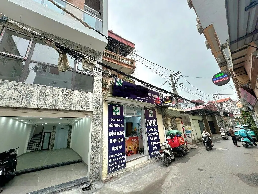 Bán Nhà Phố Trạm Long Biên 56m2 x 7 tầng Thang Máy Gara ô tô ngõ thông ô tô tránh kinh doanh tốt
