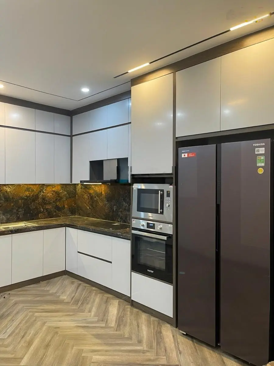 Bán nhà phân lô Huỳnh Thúc Kháng, ngõ thông 2 ô tô tránh, gara, vỉa hè, KD, 65m2.8T, thang máy.