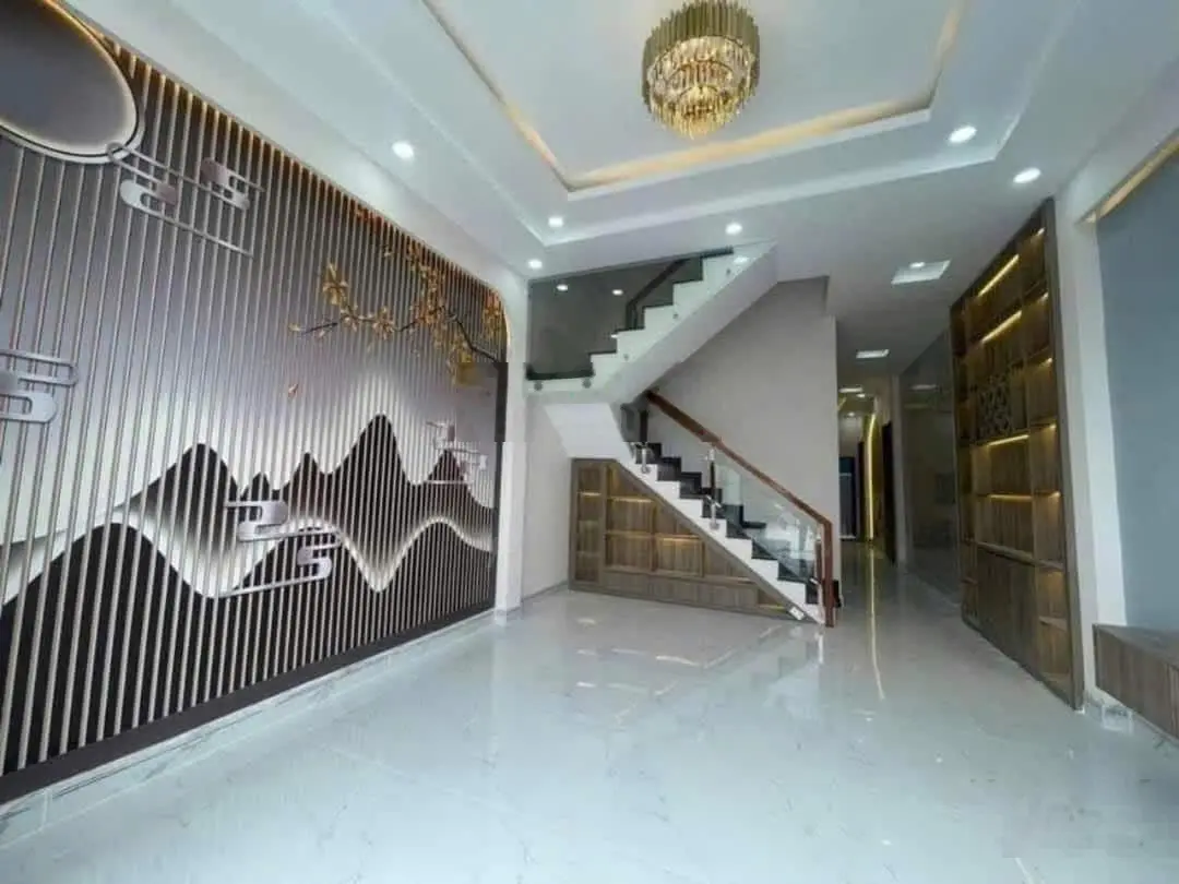Bán nhà riêng cách chợ Bình Chánh 5km DT 112 m2. Sổ hồng riêng. Nhà mới 100%