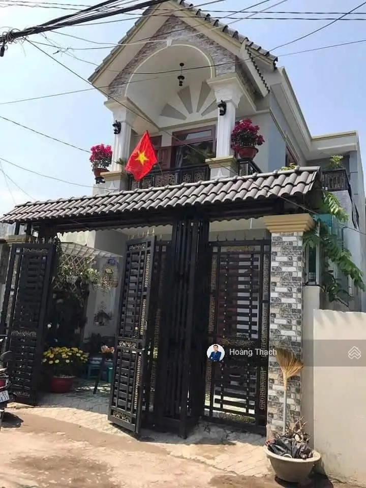 Nhà 1 trệt 1 lầu chợ Dĩ An 1 ngang 6m đường thông giá rẻ