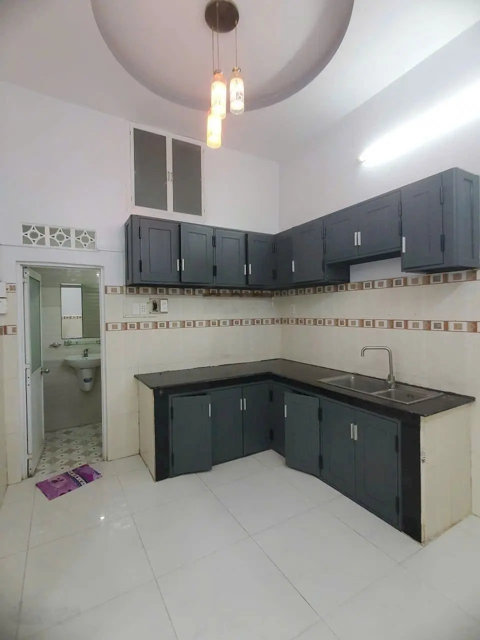 Bán nhà 4 tầng mặt tiền hẻm 67 Đào Tông Nguyên. Hẻm xe hơi 6 m thông tứ phía. Giá 5.3 tỷ tl