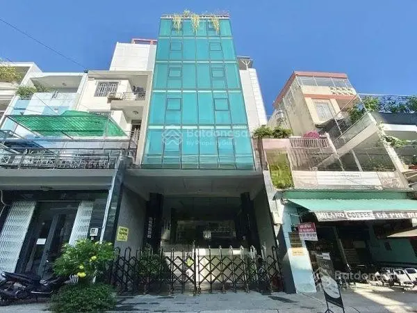 Tòa nhà mặt tiền Nguyễn Gia Trí (15mX20m)hầm 5 tầng full nội thất gần trường Hutech giá 65 tỷ