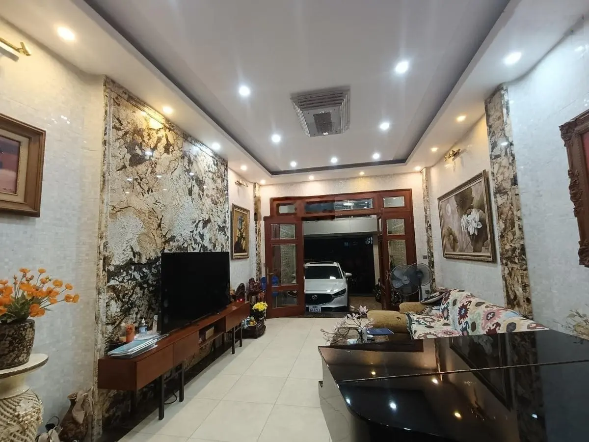 Bán nhà Hoàng Cầu Đống Đa DT 60m2 4 tầng ga ra ô tô 3 bứớc ra phố, giá chào bán 16 tỷ