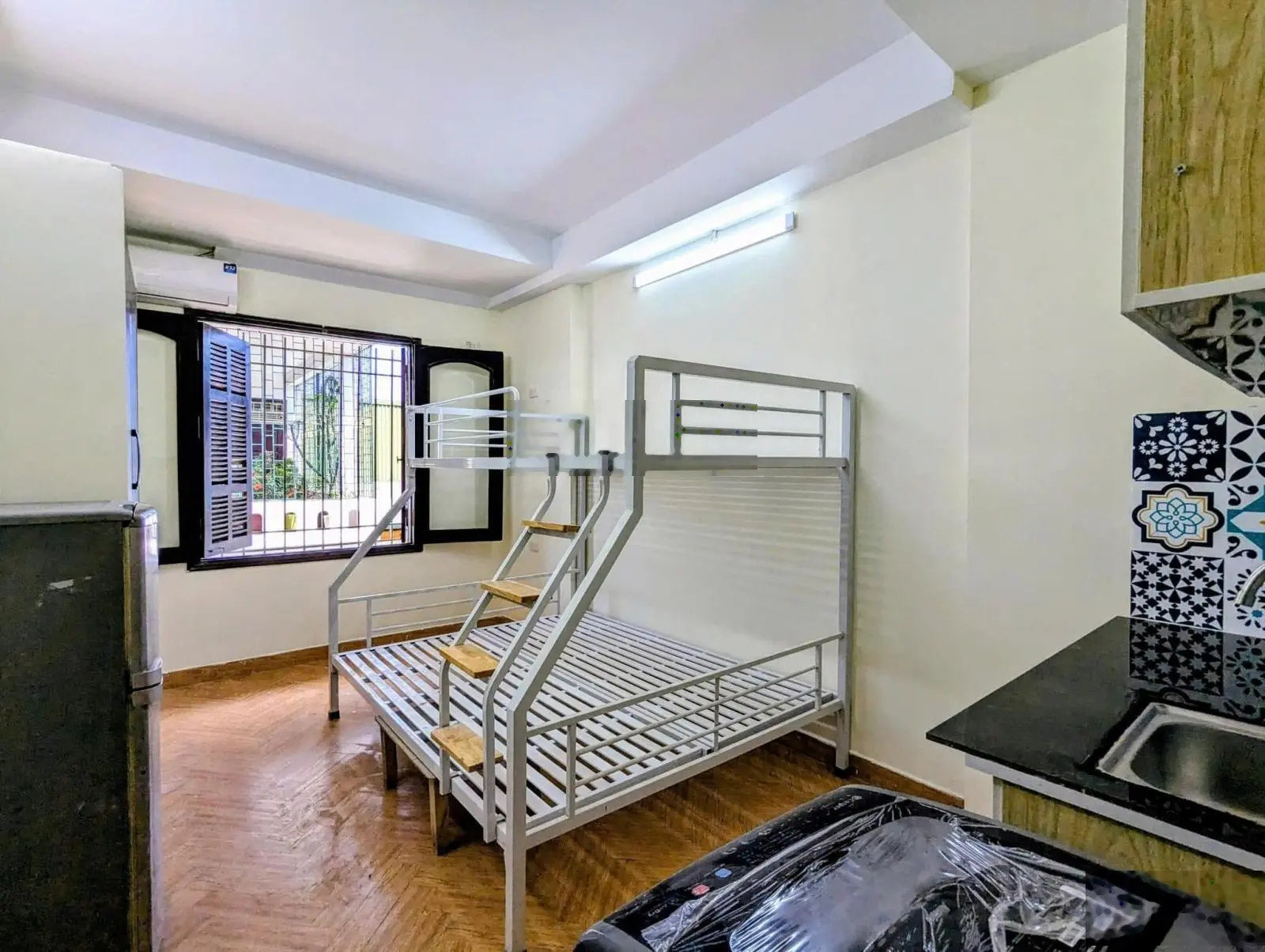 12.5 tỷ - 45m2 - 6 tầng - 11 phòng - ô tô đỗ cửa - ngõ thông - Nguyễn An Ninh