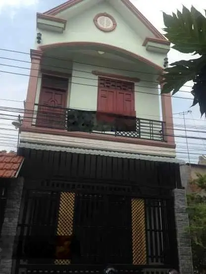 Bán nhà 1 trệt, 2 lầu MT đường Nguyễn Hữu Trí, Tân Túc, Bình Chánh, HCM. DT: 6m x 33m. Giá 15.5 tỷ