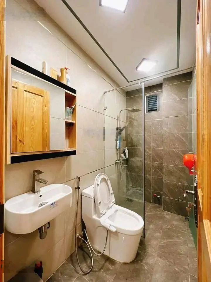 Về quê ở cần bán nhà Đường Nguyễn Đức Cảnh P. Tân Phong Quận 7 Giá 2tỷ970/58,5m2(4,5x13) có sẵn sổ.