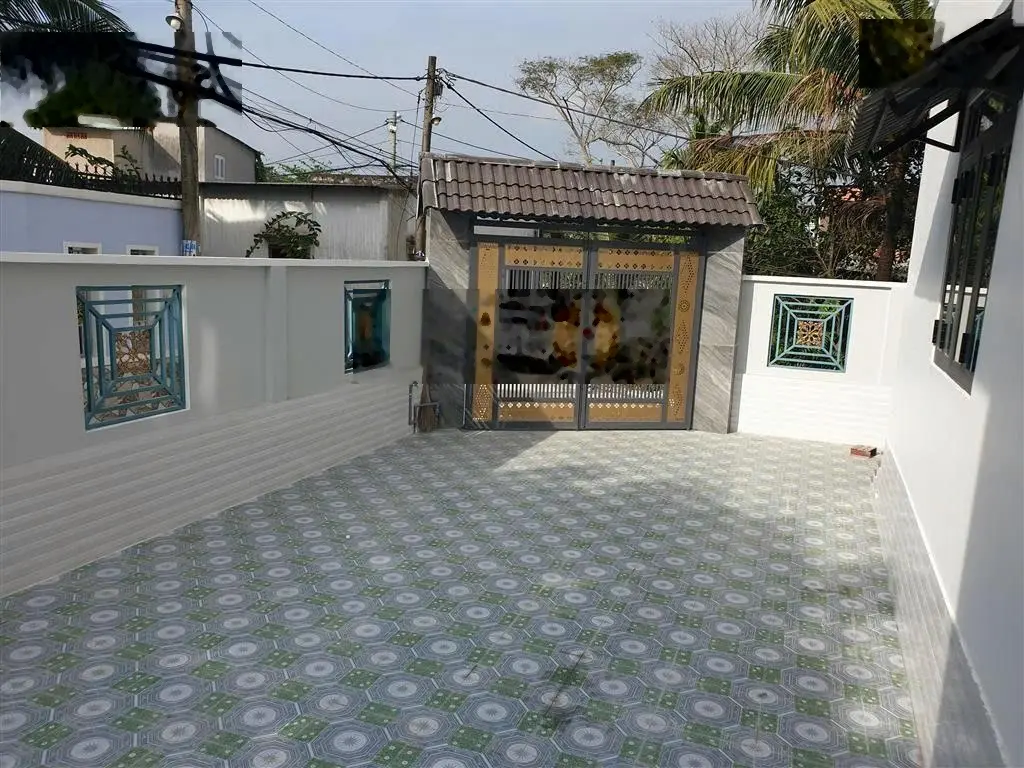Bán nhà 1 lầu góc 2MT DT: 10 x 18m gần ngã 3 Ô Trác, Chợ Tân Hiệp