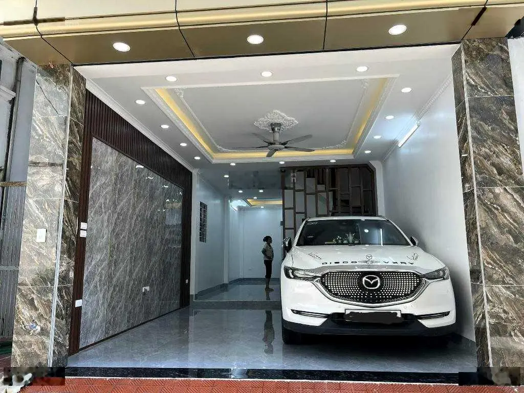 Bán nhà đẹp Đông Mỹ, thang máy, gara ô tô, nhà mới 65m x 5 tầng, MT 4,5m, full nội thất, ở ngay