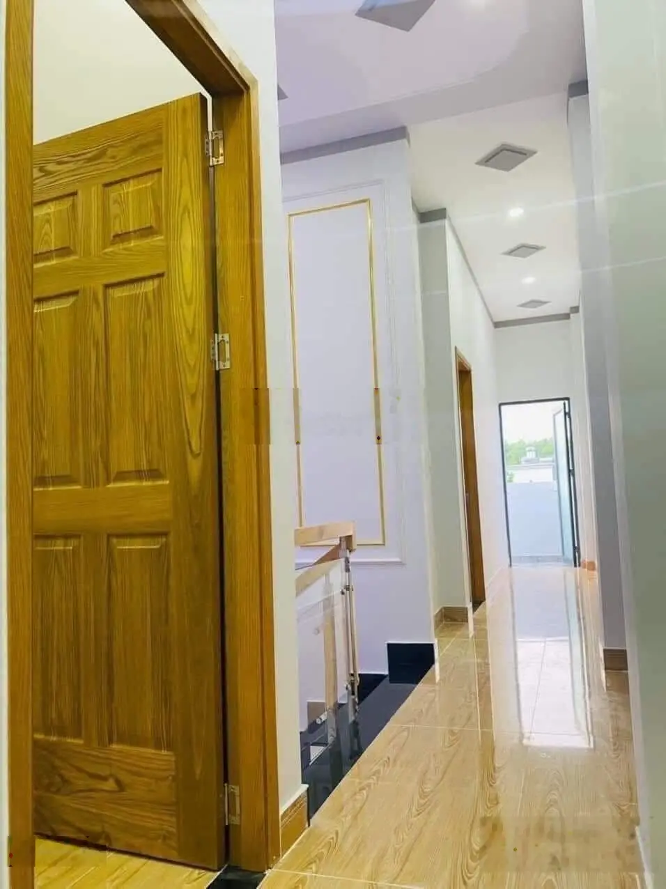 Bán nhà mới 2lầu 100m2 sổ riêng đường lớn ngay chân cầu Hoá An