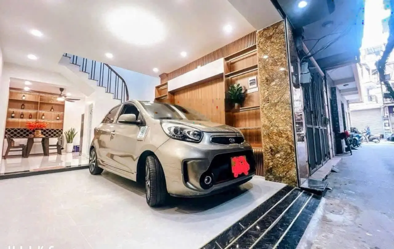 Bán nhà mặt ngõ Hoàng Cầu, 6 tầng, lô góc giá 10 tỷ