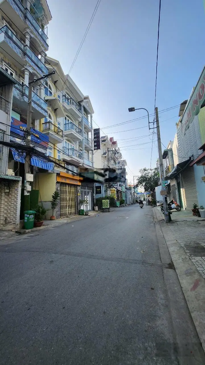 Gấp bán nhà Mặt Tiền Kinh Doanh, đường Lê Đình Cẩn, 65m2 6 TẦNG THANG MÁY, 9 phòng, thu nhập 50tr