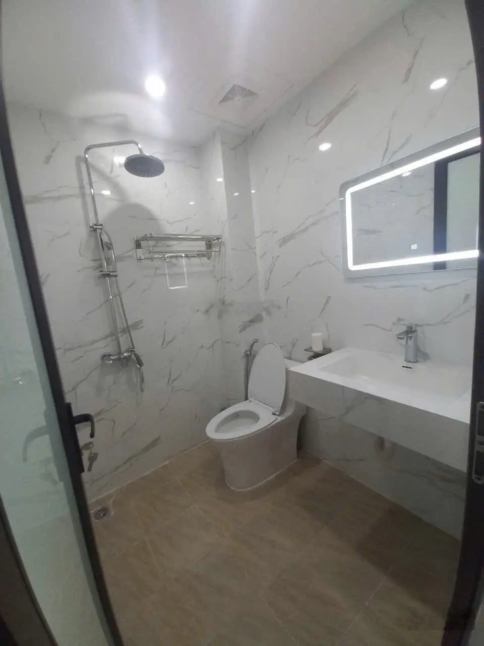 Trường Chinh, Đống Đa. DT 38m² x 4 tầng, MT 3,1m, giá 12,5 tỷ. Ngõ thông, ô tô đỗ cửa.
