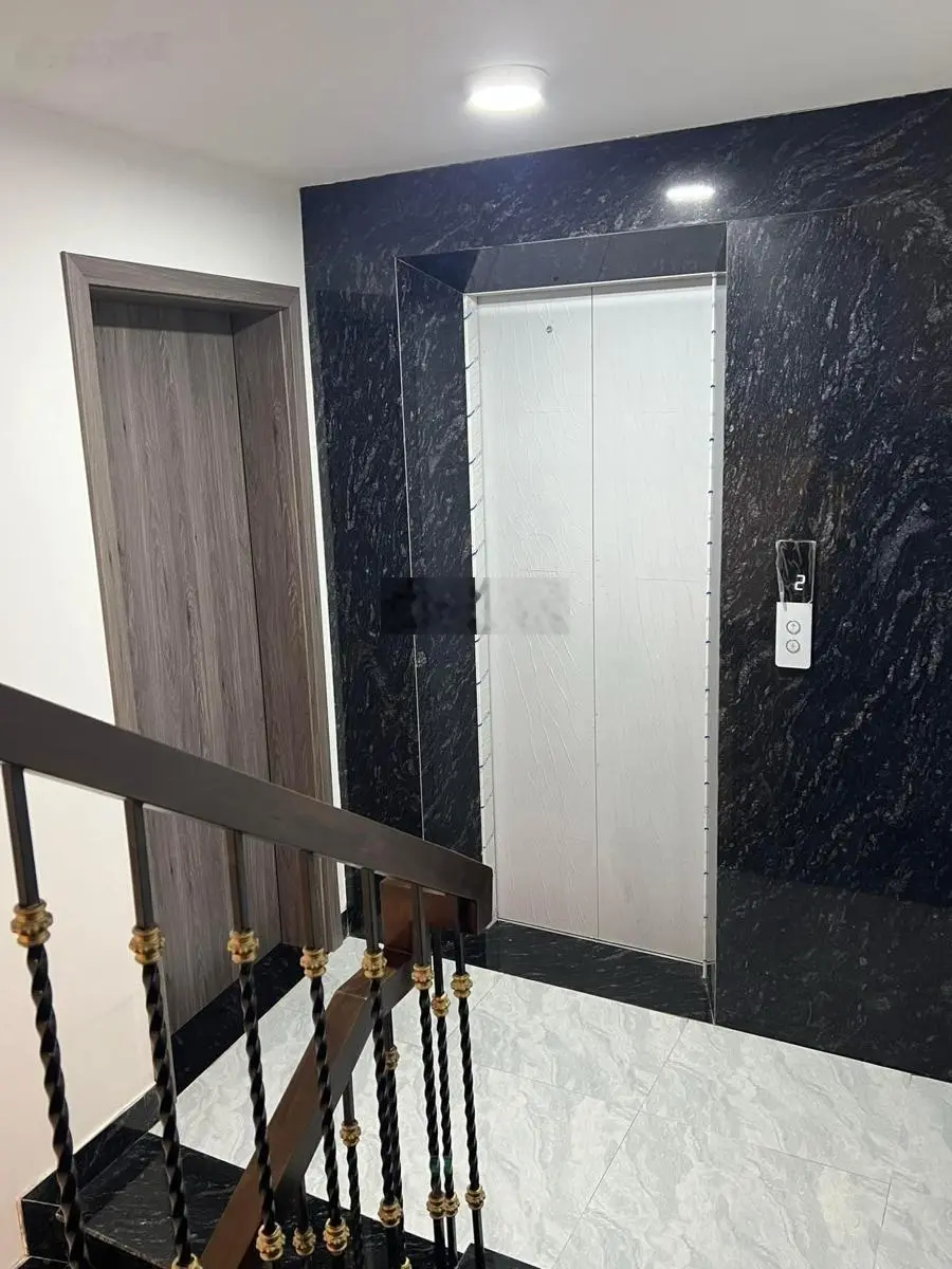 Bán nhà Hoàng Cầu 210tr/m - nhà xây mới - 53m - 7tầng thang máy - MT 6,8m