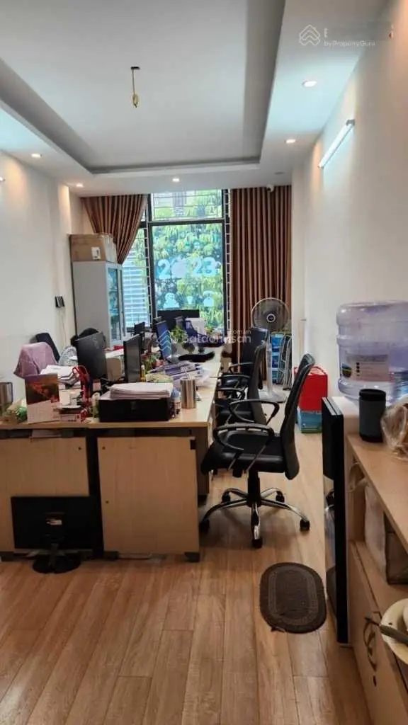 Tòa nhà 7 tầng vừa ở vừa làm văn phòng phố Dương Khuê 65m2, MT 4.5m giá 24 tỷ