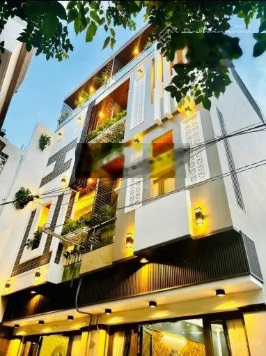 Cần bán tòa nhà văn phòng đường Trường Sơn, DT 8 x 20m. Hầm 6 lầu + ST. Mới