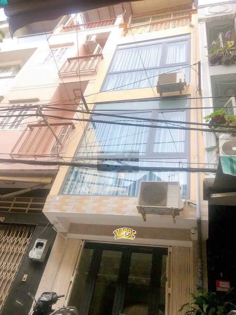 Bán nhà đường số , 4 tầng , dt 21m2 , hẻm xe hơi , Quận 4.