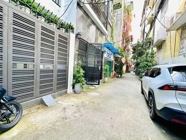 Bán Nhà Đống Đa Tây Sơn ngõ rộng thông thoáng Nhà Mới đẹp có Thang Máy oto đỗ cửa DT 52m Giá17,5 tỷ