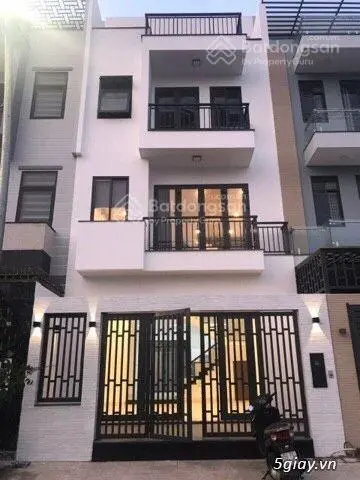 Chính chủ cần bán nhà Trần Quý Kiên DT 81m2 xây 5 tầng mặt tiền 5,9m, đường 2 ô tô tránh nhau