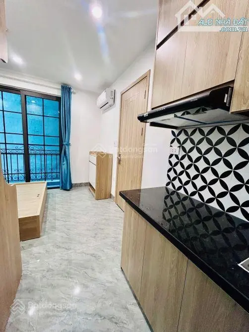 Tòa nhà cho thuê thịnh quang - 12 phòng - thu 65tr/th - giá 10.8 tỷ