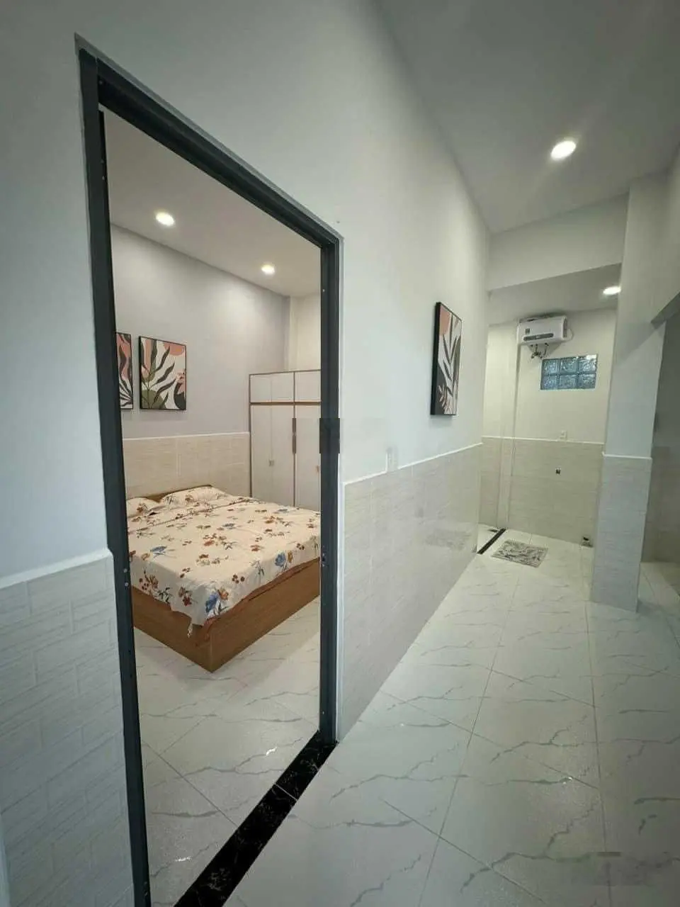 Bán nhà 1 trệt, 1 lửng, 1 lầu, MT đường Nguyễn Hữu Trí, TT Tân Túc, Bình Chánh, HCM. DT: 5m x21m