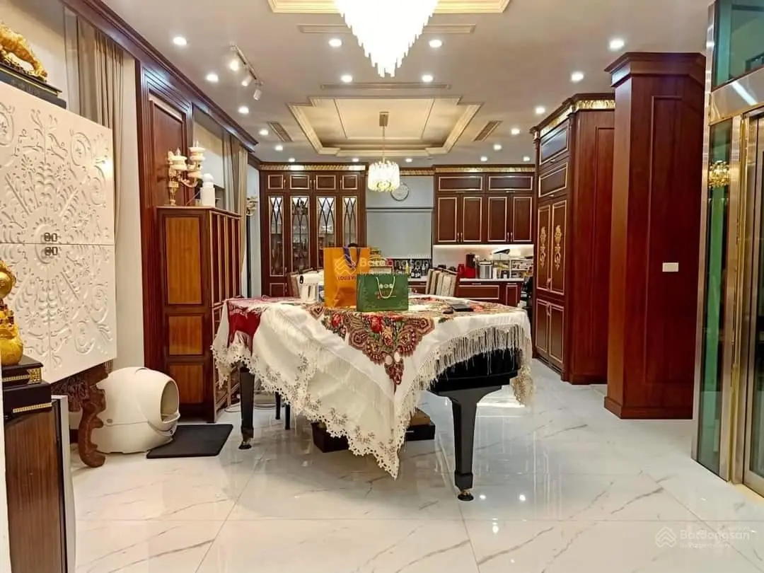 Bán nhà văn phòng Nguyễn Văn Huyên Cầu Giấy 77m2, 24 chỗ, 8 tầng, nhỉnh 22 tỷ /thông sàn