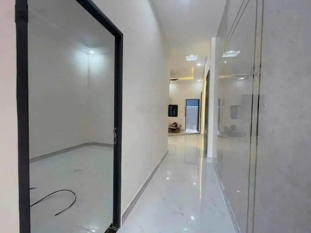 Bán nhà riêng cách chợ Bình Chánh 5km DT 112 m2. Sổ hồng riêng. Nhà mới 100%