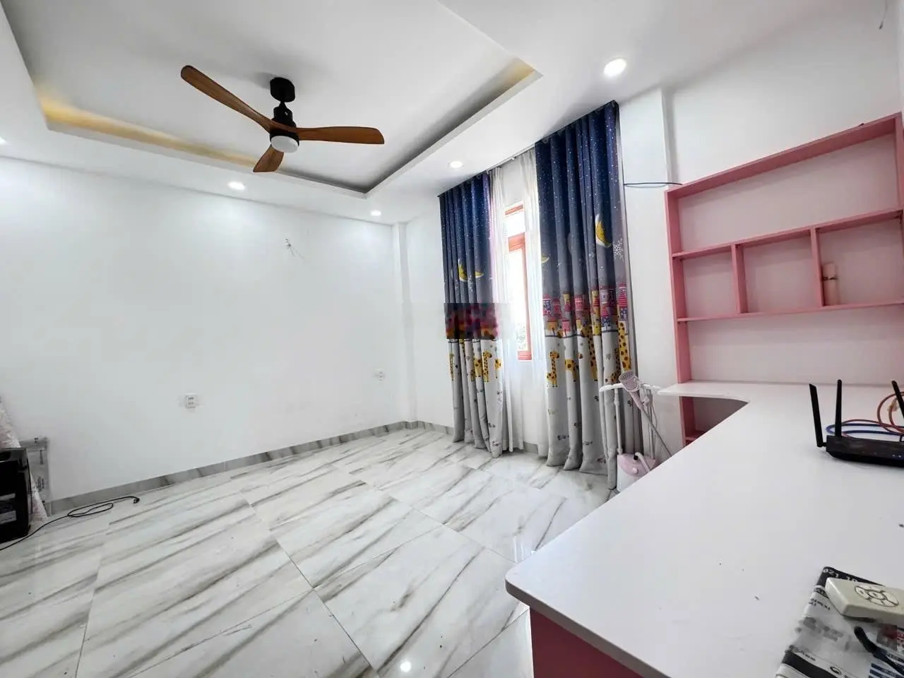 Nhà mặt tiền đường 12 hiệp bình chánh gần đại học luật 4tầng 6pn,5wc dt: 7 x 17