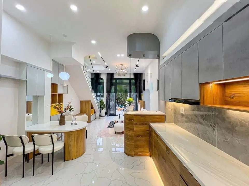 Bán nhà riêng cách chợ Bình Chánh 5km DT 112 m2. Sổ hồng riêng. Nhà mới 100%