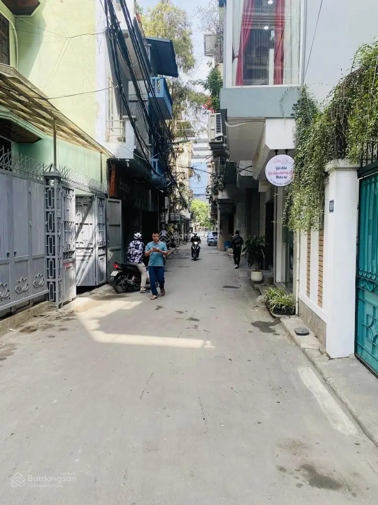 Bán nhà 7 tầng Thái Hà, dòng tiền cao 75 triệu/th, 2 mặt ngõ, gần phố, thang máy, giá 14.5 tỷ
