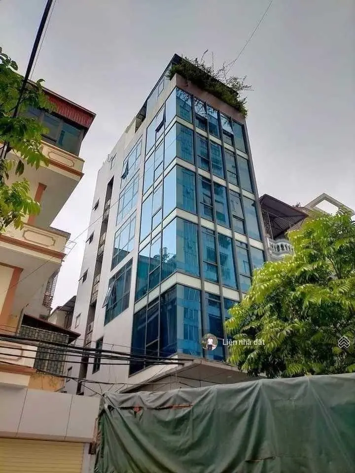 Cần bán nhanh tòa văn phòng phố Mai Dịch 80m2 8 tầng 22.5 tỷ lô góc 3 mặt thoáng